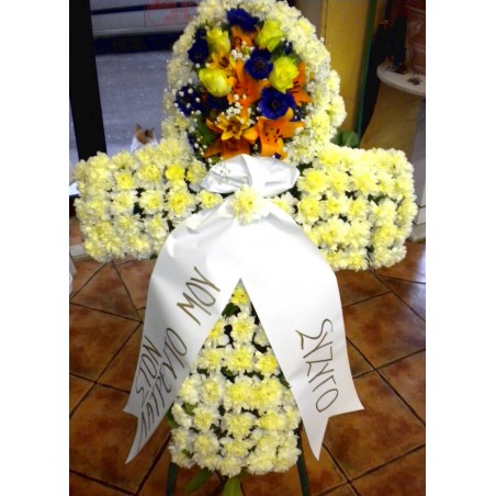 flower cross for funeral. funeral cross. funeral flowers in drama