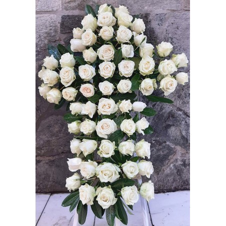 funeral cross made with white roses